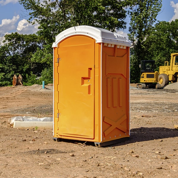 how often are the portable restrooms cleaned and serviced during a rental period in Sand Creek